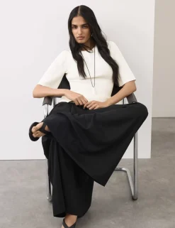 Crew Neck Peplum Knitted Top