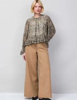 Leopard Print Round Neck Ruffle Hem Blouse
