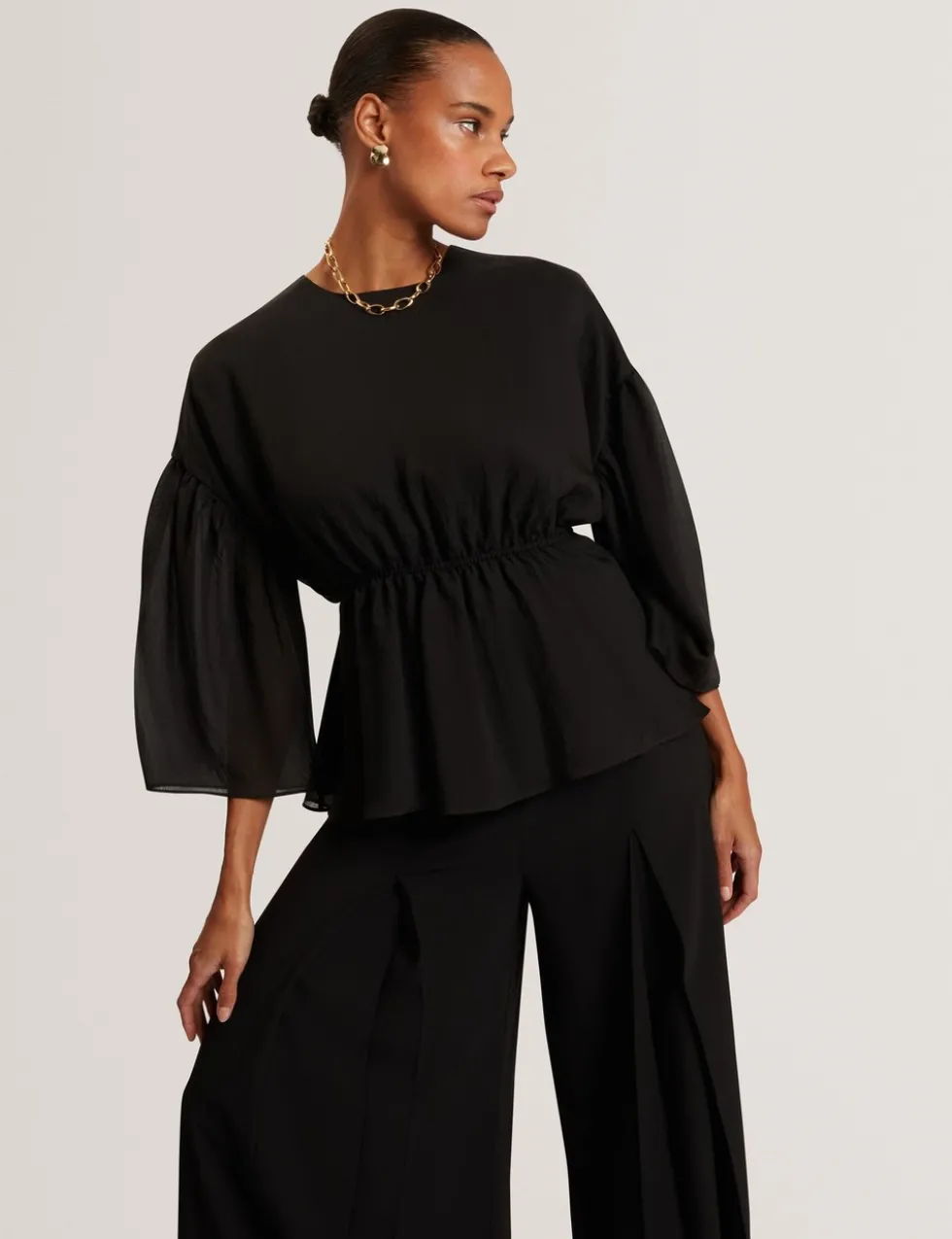 Lyocell Rich Puff Sleeve Peplum Top