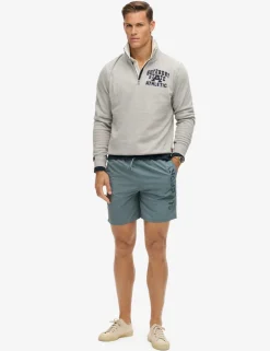 Pocketed Embroidered Logo Swim Shorts